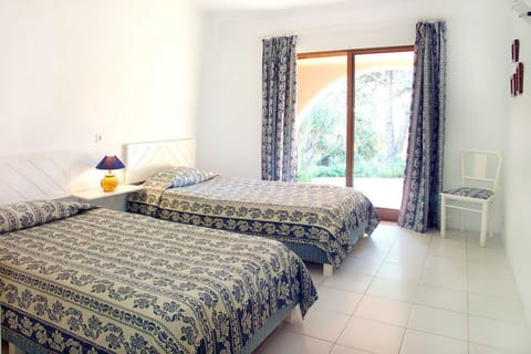 Villa, 1 Bedroom, Balcony | In-room safe, iron/ironing board, free cribs/infant beds, bed sheets