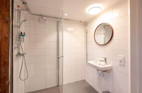 Design Suite | Bathroom | Shower, free toiletries, towels, soap