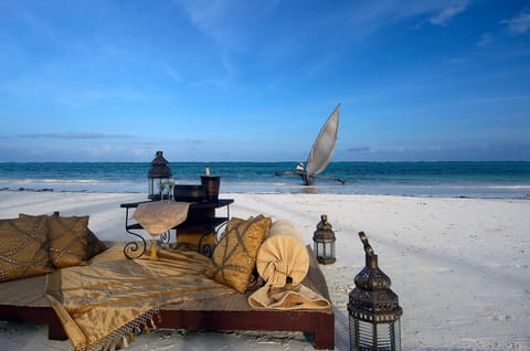 Private beach, white sand, free beach cabanas, sun loungers