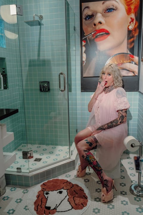 Design Room, 1 King Bed | Bathroom | Shower, rainfall showerhead, hair dryer, towels