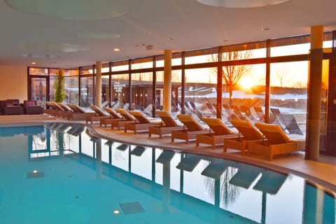Indoor pool, open 6:30 AM to 9:00 PM, pool umbrellas, sun loungers