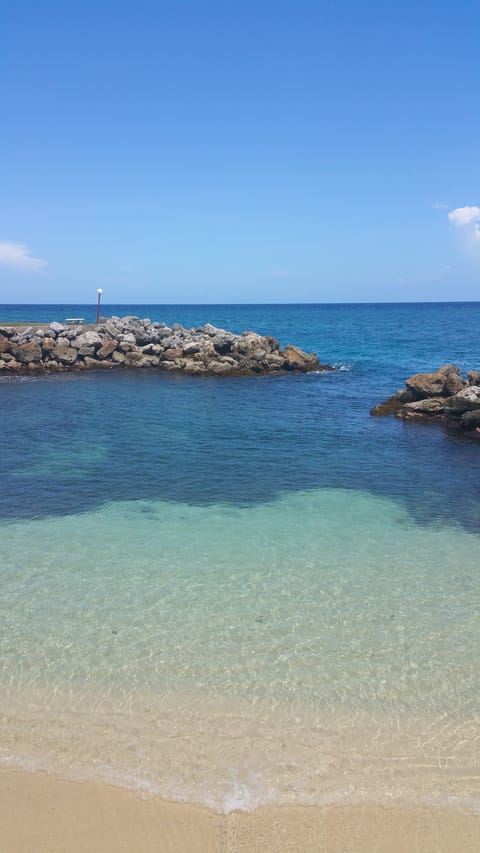 Private beach nearby, white sand, sun loungers, beach towels