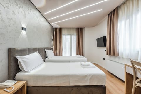 Superior Twin Room | Frette Italian sheets, premium bedding, down comforters
