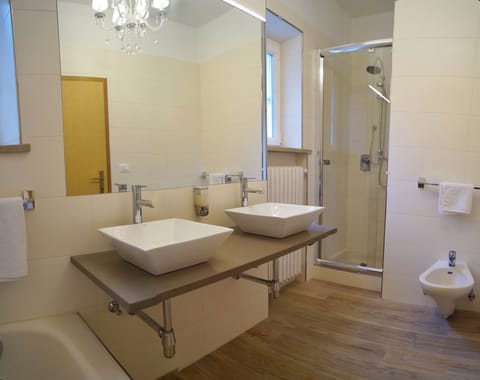 Suite, Pool View | Bathroom | Shower, hair dryer, towels