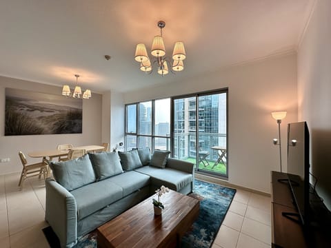 Signature Apartment | Living area | 60-inch Smart TV with digital channels, Netflix, streaming services