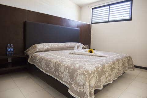 Standard Room, 1 Double Bed | Down comforters, blackout drapes, iron/ironing board, free WiFi