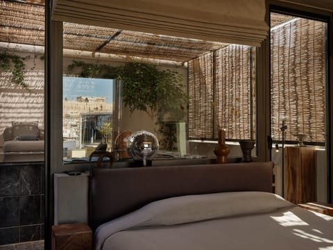 Acropolis View Supreme Suite Outdoor Jetted Tub | Egyptian cotton sheets, premium bedding, down comforters