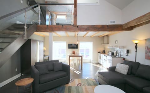 Loft Suite 2 | Living area | Flat-screen TV, fireplace