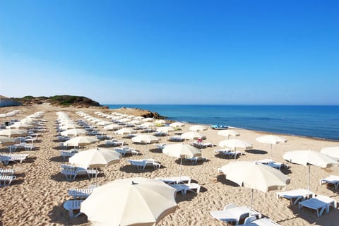 Private beach nearby, sun loungers, beach umbrellas