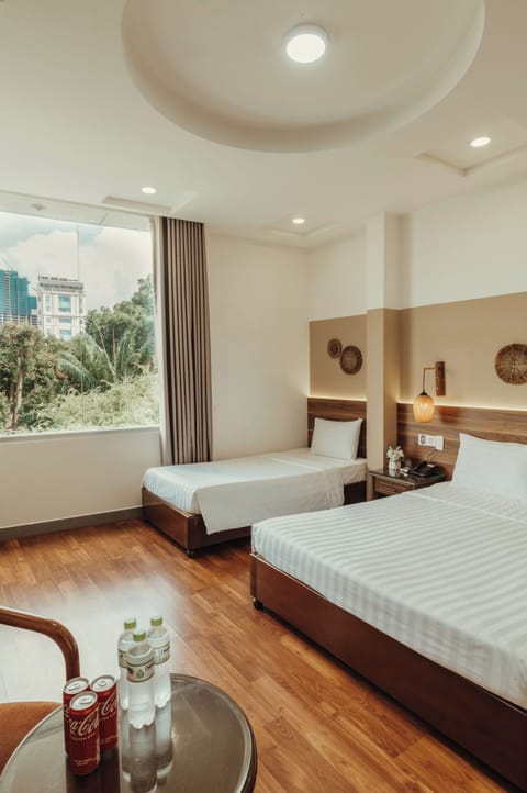Deluxe Triple Room | Free minibar, desk, free WiFi, bed sheets