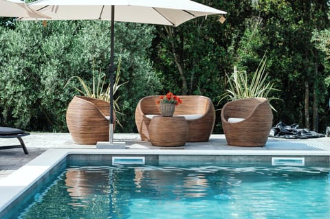 Seasonal outdoor pool, pool umbrellas, sun loungers