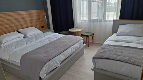 Standard Triple Room | Egyptian cotton sheets, premium bedding, Tempur-Pedic beds