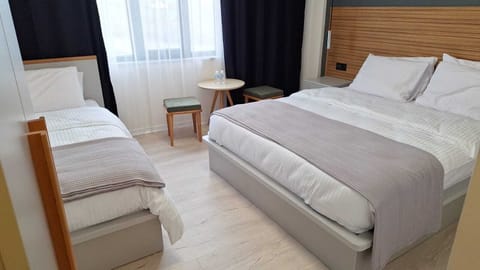 Standard Triple Room | Egyptian cotton sheets, premium bedding, Tempur-Pedic beds