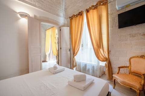 Traditional Duplex | Premium bedding, down comforters, desk, soundproofing