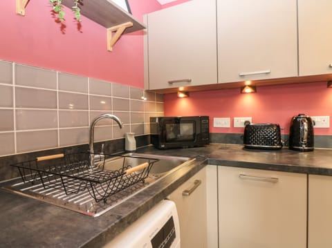 Fridge, electric kettle, toaster, cookware/dishes/utensils