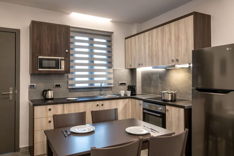 Executive Apartment, 2 Bedrooms, Jetted Tub | Private kitchen | Mini-fridge, espresso maker, coffee/tea maker, electric kettle