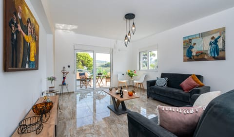 Luxury Apartment | Living area | Smart TV, table tennis, pay movies