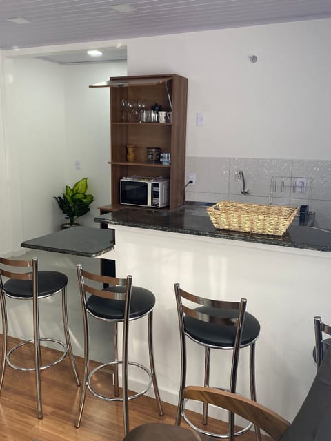 Deluxe Suite, 2 Double Beds | Private kitchen | Fridge, microwave, cookware/dishes/utensils, spices