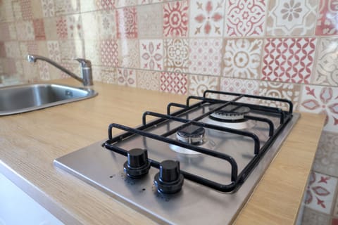 Fridge, stovetop, electric kettle, toaster