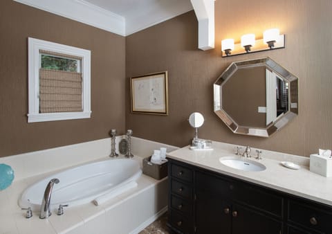 Designer toiletries, hair dryer, bathrobes, towels