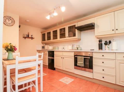 Fridge, electric kettle, toaster, cookware/dishes/utensils