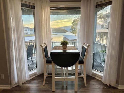 Condo, Multiple Beds, Balcony (Lazy L at the Lake) | Dining