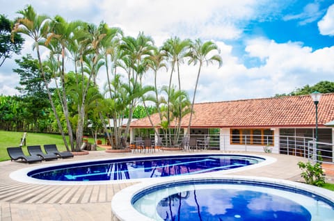 Outdoor pool, open 9:00 AM to 9:00 PM, sun loungers