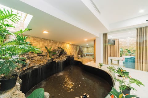 Family Suite - Pool View | Egyptian cotton sheets, premium bedding, down comforters, free minibar