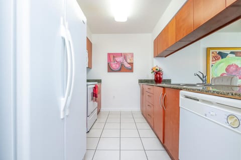 Luxury Condo | Private kitchen | Full-size fridge, microwave, oven, stovetop