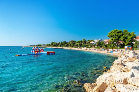 Room, 1 Bedroom, Balcony, Garden View | Beach