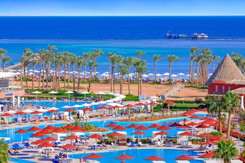 3 outdoor pools, pool umbrellas, sun loungers