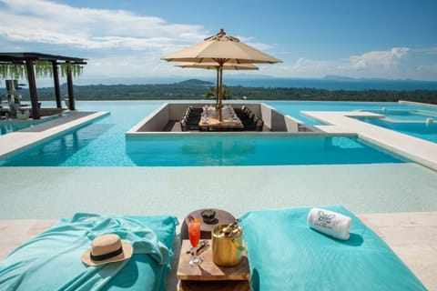 Outdoor pool, pool umbrellas, sun loungers