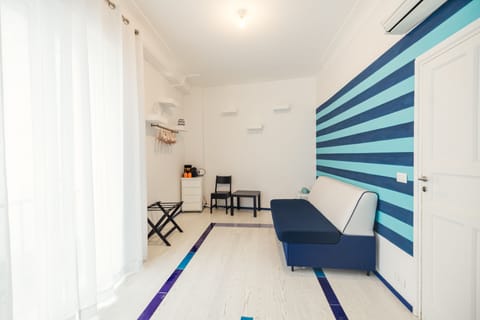 Premium Room | Living area | TV