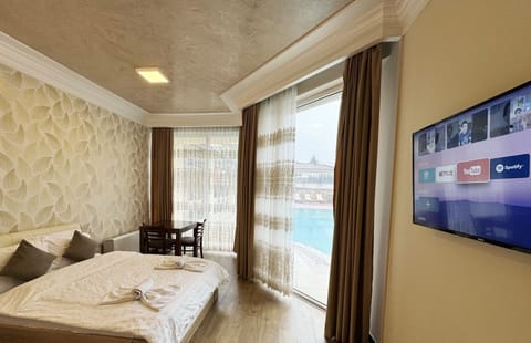 Exclusive Room, Hot Tub, Poolside | Water view