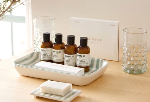 Eco-friendly toiletries, hair dryer, bathrobes, slippers