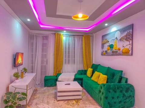Business Apartment | Living area | 24-inch Smart TV with digital channels