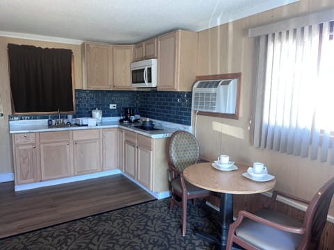 Signature Double Room | Private kitchen | Stovetop, cookware/dishes/utensils, freezer
