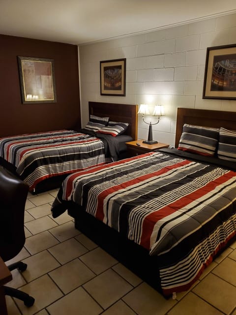 Room, 2 Queen Beds | 1 bedroom, in-room safe, free WiFi