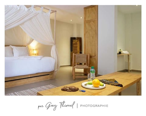 Premium bedding, down comforters, minibar, in-room safe