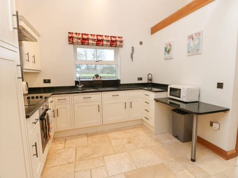 Fridge, electric kettle, toaster, cookware/dishes/utensils