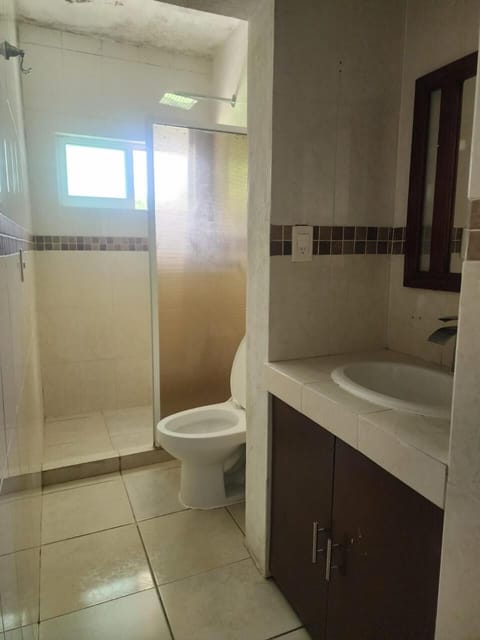 Shower, rainfall showerhead, towels