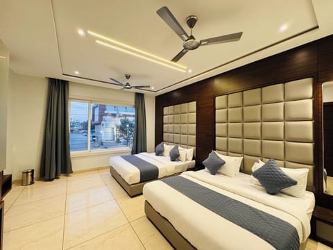 Premium Quadruple Room | Memory foam beds, soundproofing, rollaway beds (surcharge), WiFi (free)