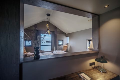 Private suite with ocean view | Premium bedding, down comforters, minibar, desk