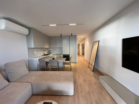 Deluxe Apartment, 1 Bedroom | Living area | 42-inch flat-screen TV with cable channels