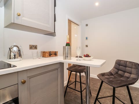 Fridge, electric kettle, toaster, cookware/dishes/utensils