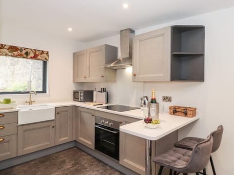 Fridge, electric kettle, toaster, cookware/dishes/utensils