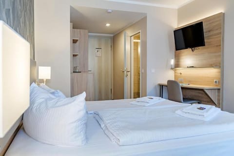 Hypo-allergenic bedding, desk, laptop workspace, free WiFi