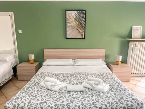 Standard Triple Room (Shared Bathroom) | Desk, free WiFi, bed sheets