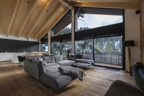 House C9 | NAGENS | Living area | 120-cm Smart TV with digital channels, Netflix, streaming services