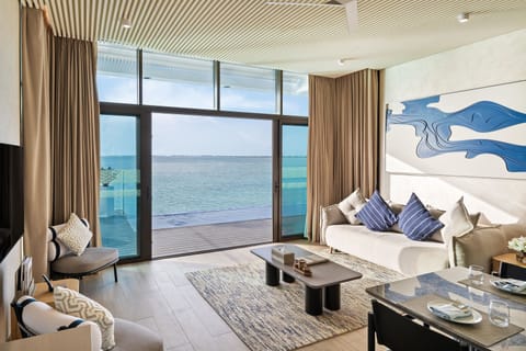 Two Bedroom Over Water Villa | Living area | 65-inch LED TV with digital channels